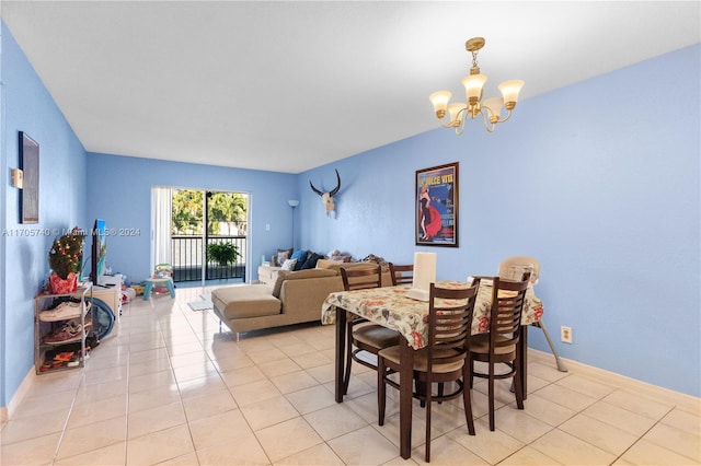 tiled dining area with a notable chandelier