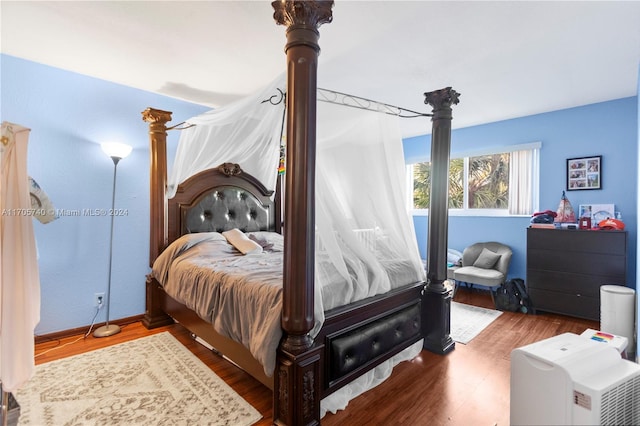 bedroom featuring hardwood / wood-style flooring