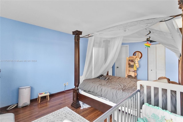 bedroom featuring dark hardwood / wood-style floors