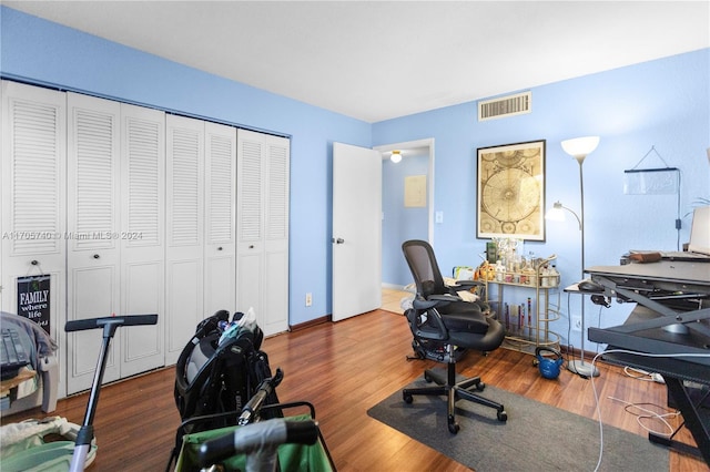 office space featuring dark wood-type flooring