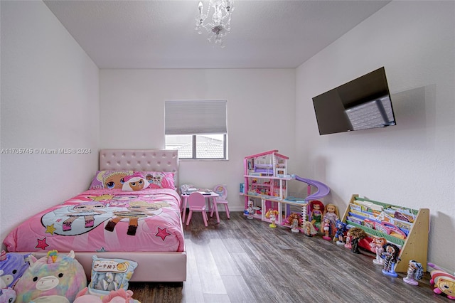 bedroom featuring wood-type flooring