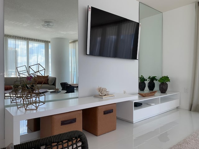 home office featuring a textured ceiling