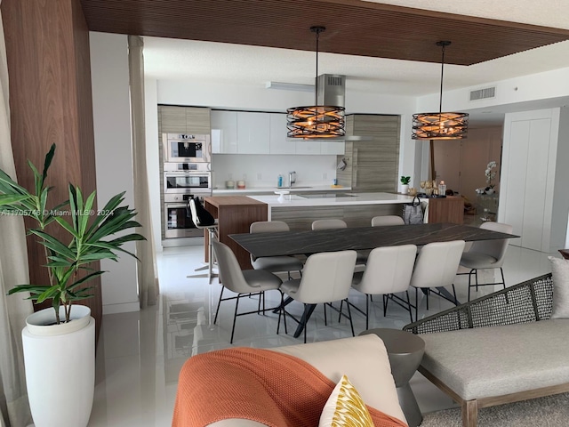 330 Sunny Isles Blvd Unit 5-2407, Sunny Isles Beach, FL 33160 - dining area with a chandelier