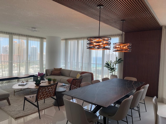 330 Sunny Isles Blvd Unit 5-2407, Sunny Isles Beach, FL 33160 - dining room with healthy amount of natural light and a chandelier