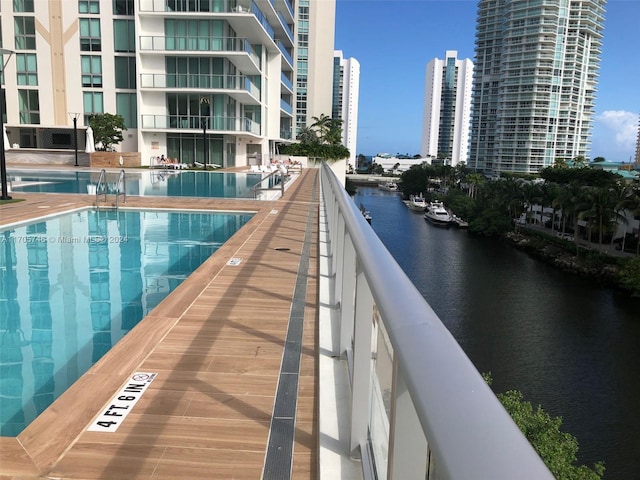 330 Sunny Isles Blvd Unit 5-2407, Sunny Isles Beach, FL 33160 - community pool featuring a water view