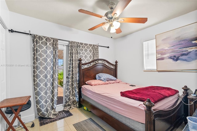 bedroom featuring ceiling fan and light tile patterned flooring