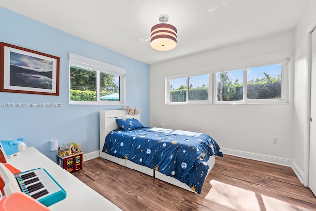 bedroom featuring hardwood / wood-style flooring