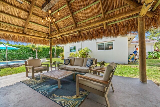 view of patio with a gazebo and an outdoor living space