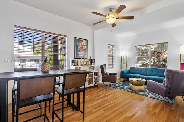 dining room featuring ceiling fan and wood-type flooring