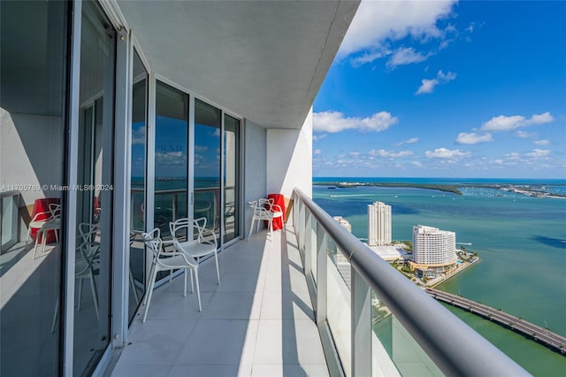 balcony featuring a water view