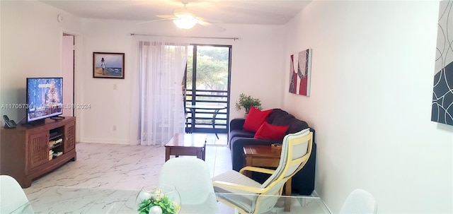 living room featuring ceiling fan