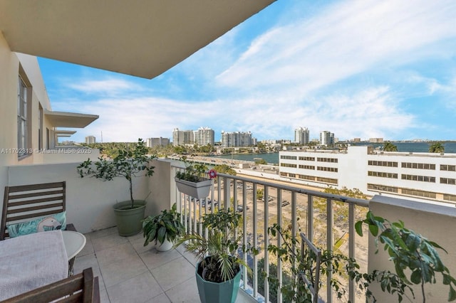 balcony featuring a water view