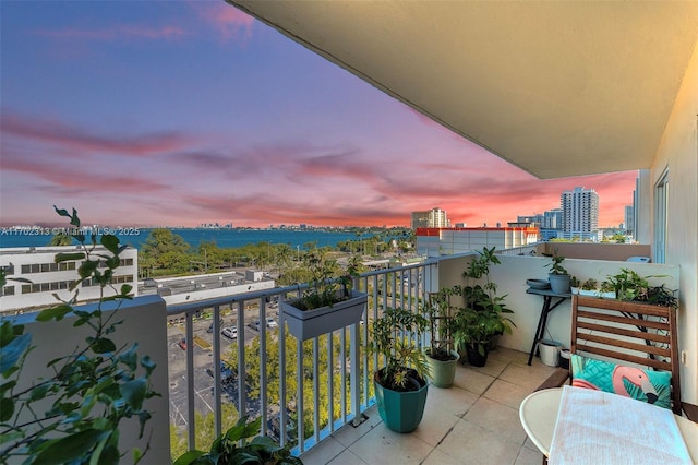 balcony at dusk with a water view