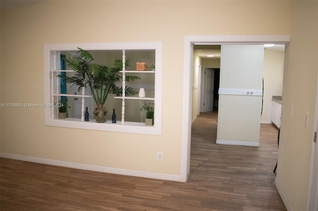 corridor with dark wood-type flooring