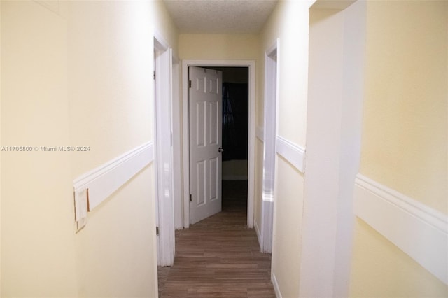 hallway featuring hardwood / wood-style floors