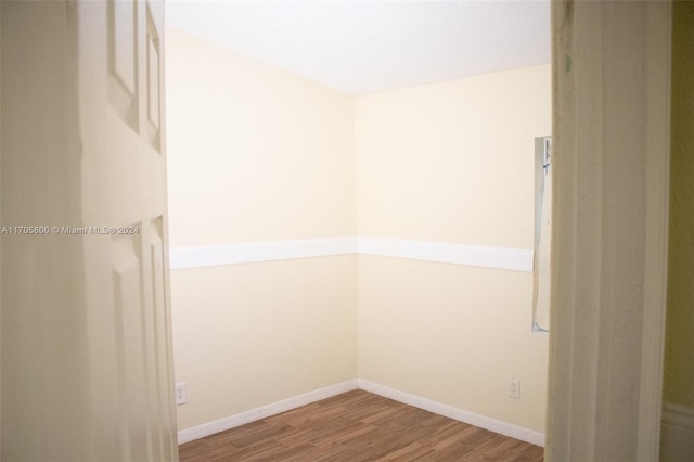 empty room featuring wood-type flooring