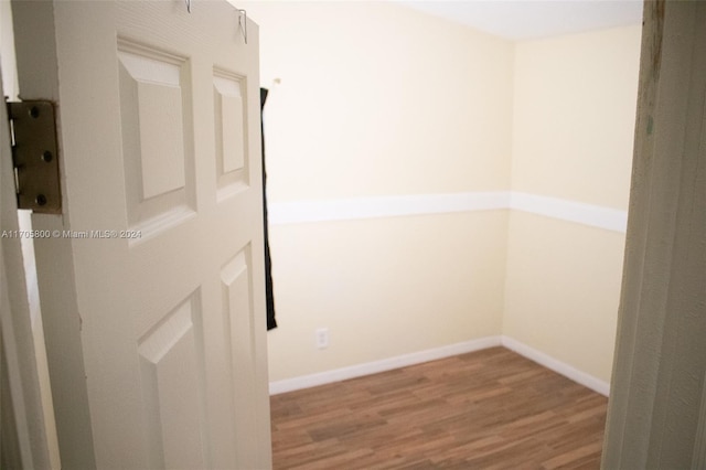 unfurnished room featuring hardwood / wood-style floors