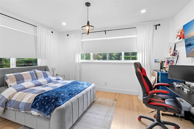 bedroom featuring light hardwood / wood-style floors