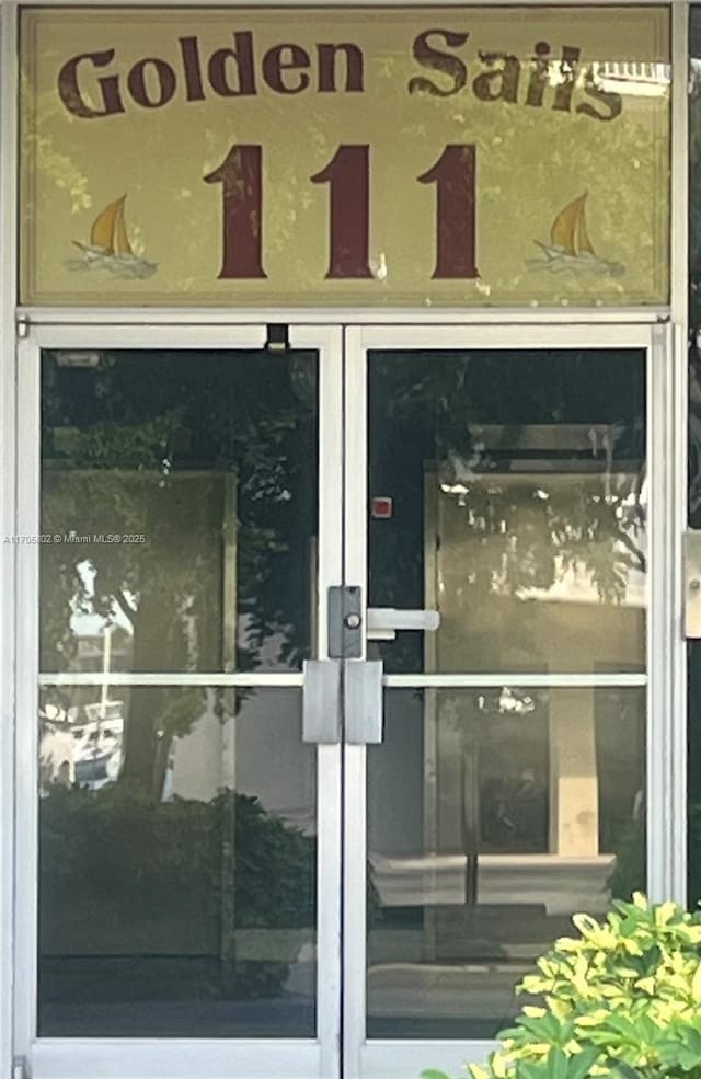 doorway to property featuring french doors