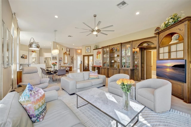 living room featuring ceiling fan