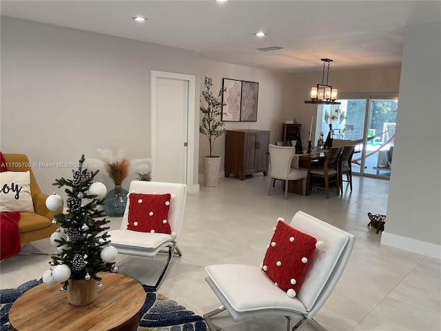 living room featuring an inviting chandelier