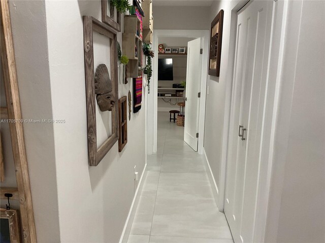 bathroom with tile patterned floors, vanity, and toilet