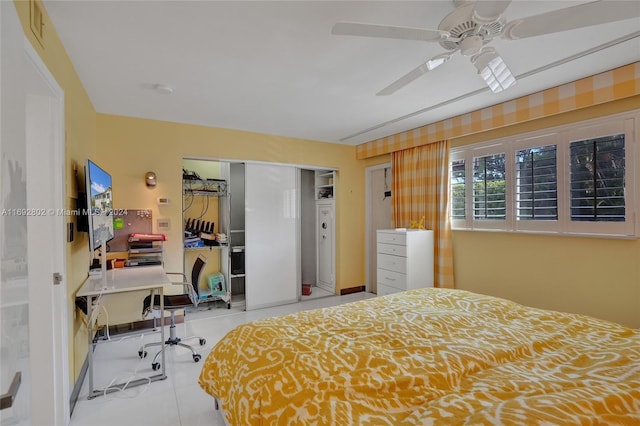 bedroom featuring a closet and ceiling fan