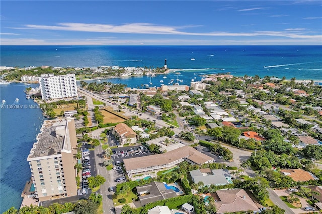 birds eye view of property featuring a water view