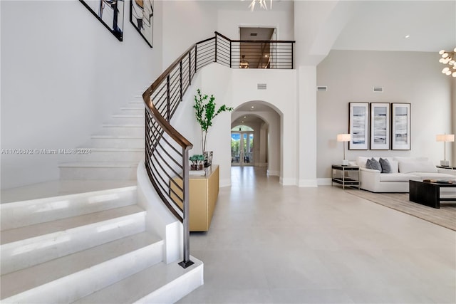 foyer featuring a high ceiling