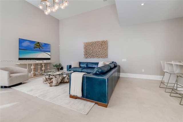 living room with an inviting chandelier