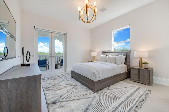 bedroom with french doors, access to outside, multiple windows, and a notable chandelier