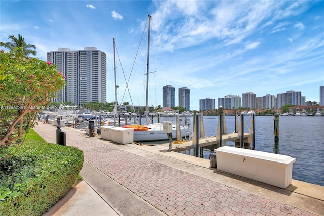 3640 Yacht Club Dr Unit 607, Aventura, FL 33180 - dock featuring a view of skyline and a water view