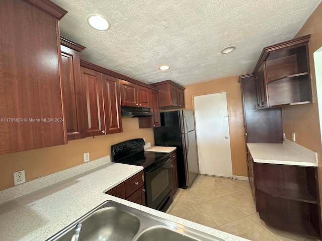 kitchen with stainless steel fridge, a textured ceiling, sink, light tile patterned floors, and black electric range oven