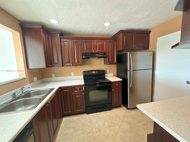 kitchen with black electric range oven, sink, stainless steel fridge, light tile patterned floors, and a textured ceiling