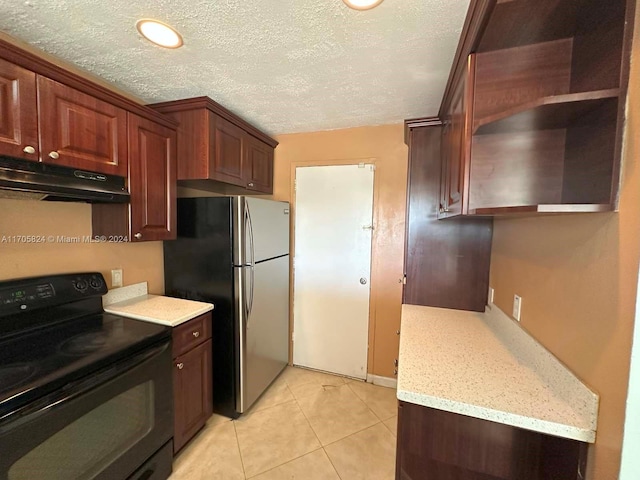 kitchen with stainless steel refrigerator, black range with electric cooktop, light stone counters, a textured ceiling, and light tile patterned floors