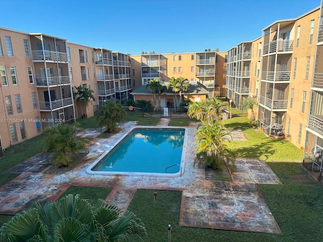 view of swimming pool with a patio