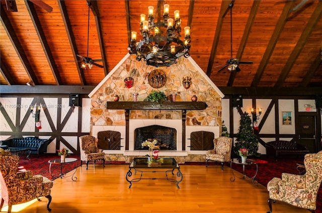 living room featuring a fireplace, lofted ceiling with beams, hardwood / wood-style flooring, and wood ceiling