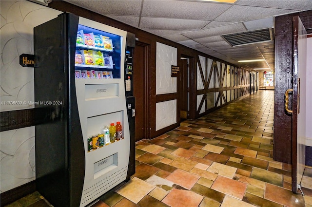 interior space featuring a paneled ceiling