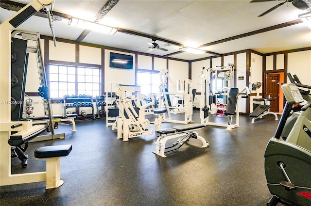 exercise room with ceiling fan