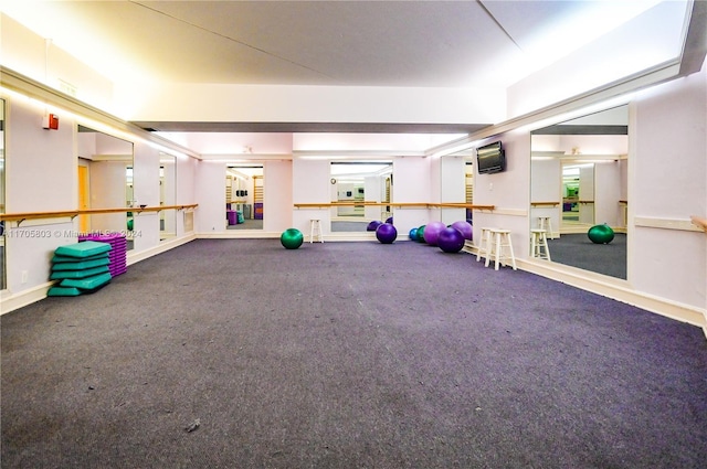 exercise room with carpet floors