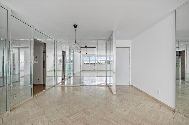 spare room featuring light parquet flooring