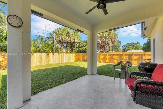 view of patio featuring ceiling fan