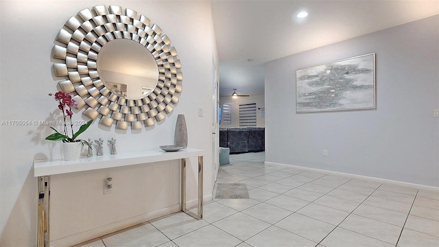 hallway featuring light tile patterned flooring