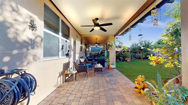 view of patio / terrace with ceiling fan and an outdoor hangout area