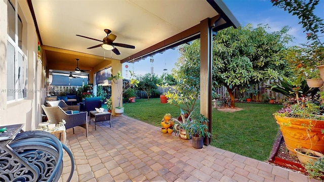 view of patio / terrace with outdoor lounge area and ceiling fan