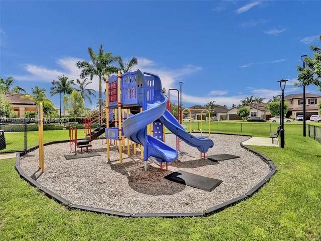 view of play area with a yard