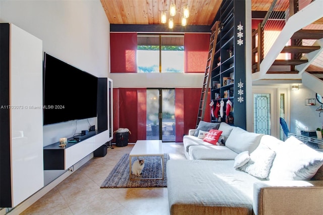 living room with wooden ceiling and a towering ceiling