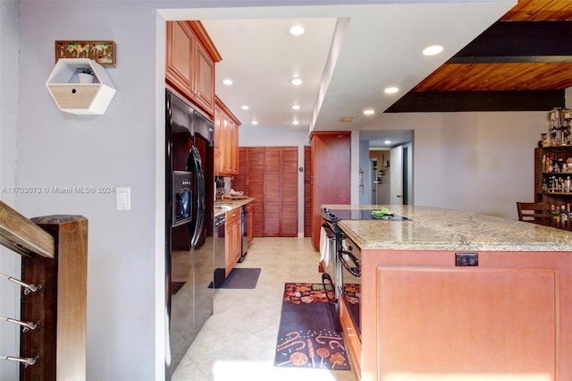 kitchen with light stone counters, wood ceiling, and appliances with stainless steel finishes