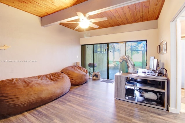 office space with beamed ceiling, ceiling fan, wood-type flooring, and wooden ceiling