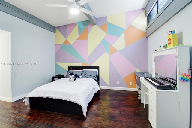 bedroom with beam ceiling, ceiling fan, and dark wood-type flooring